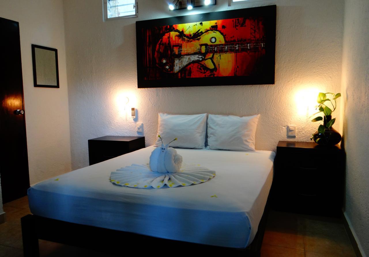 Casa Tucan Hotel Плая дел Кармен Екстериор снимка