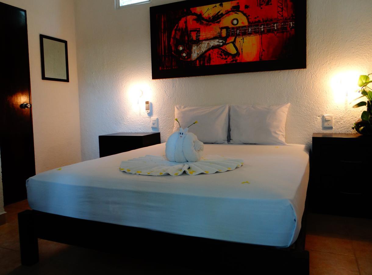 Casa Tucan Hotel Плая дел Кармен Екстериор снимка